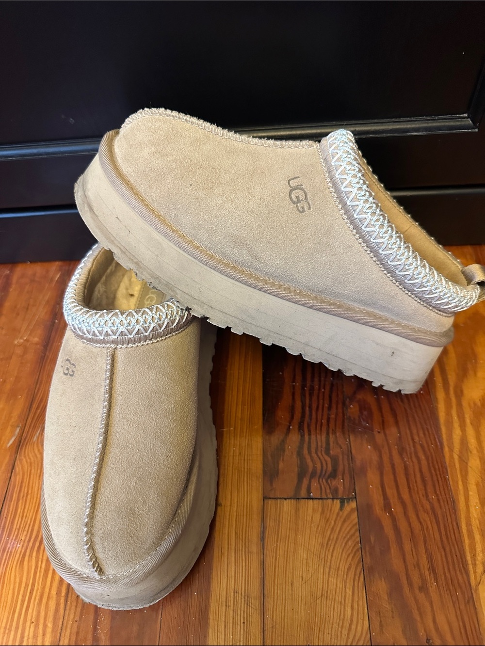 UGG women’s Slip-On Suede Clogs in Beige